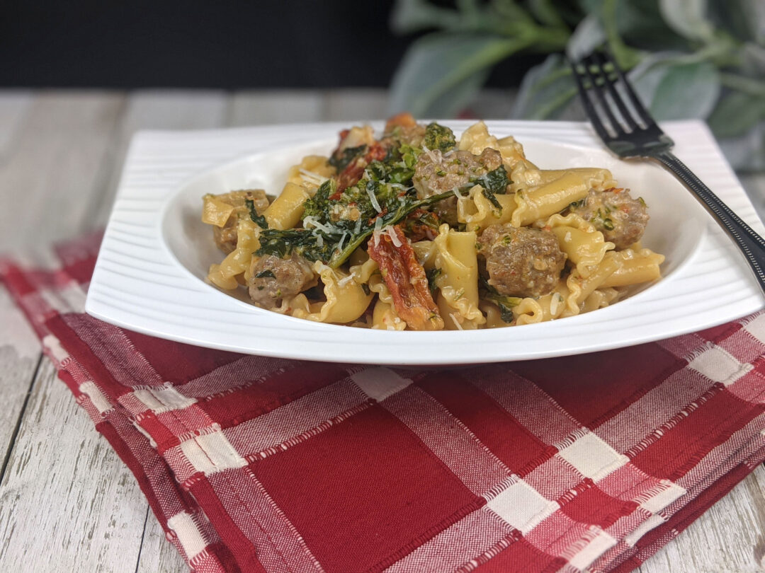 Creamy Pasta with Sausage, Broccoli Rabe and Sun Dried Tomatoes